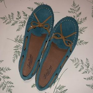 Bright turquoise Lucky Mocs!